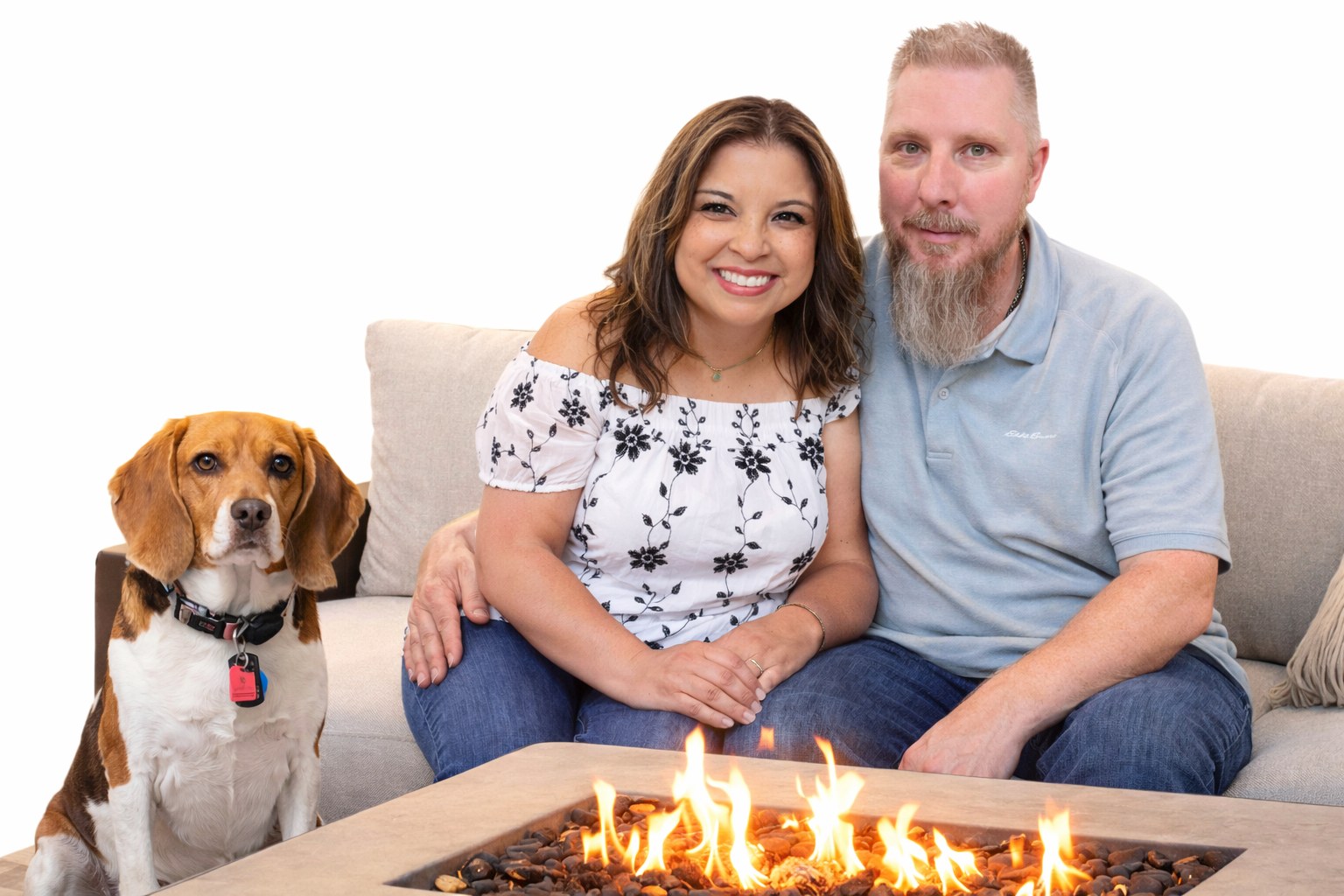 Larence, Ruthy, and Willow the beagle at home by the fire pit