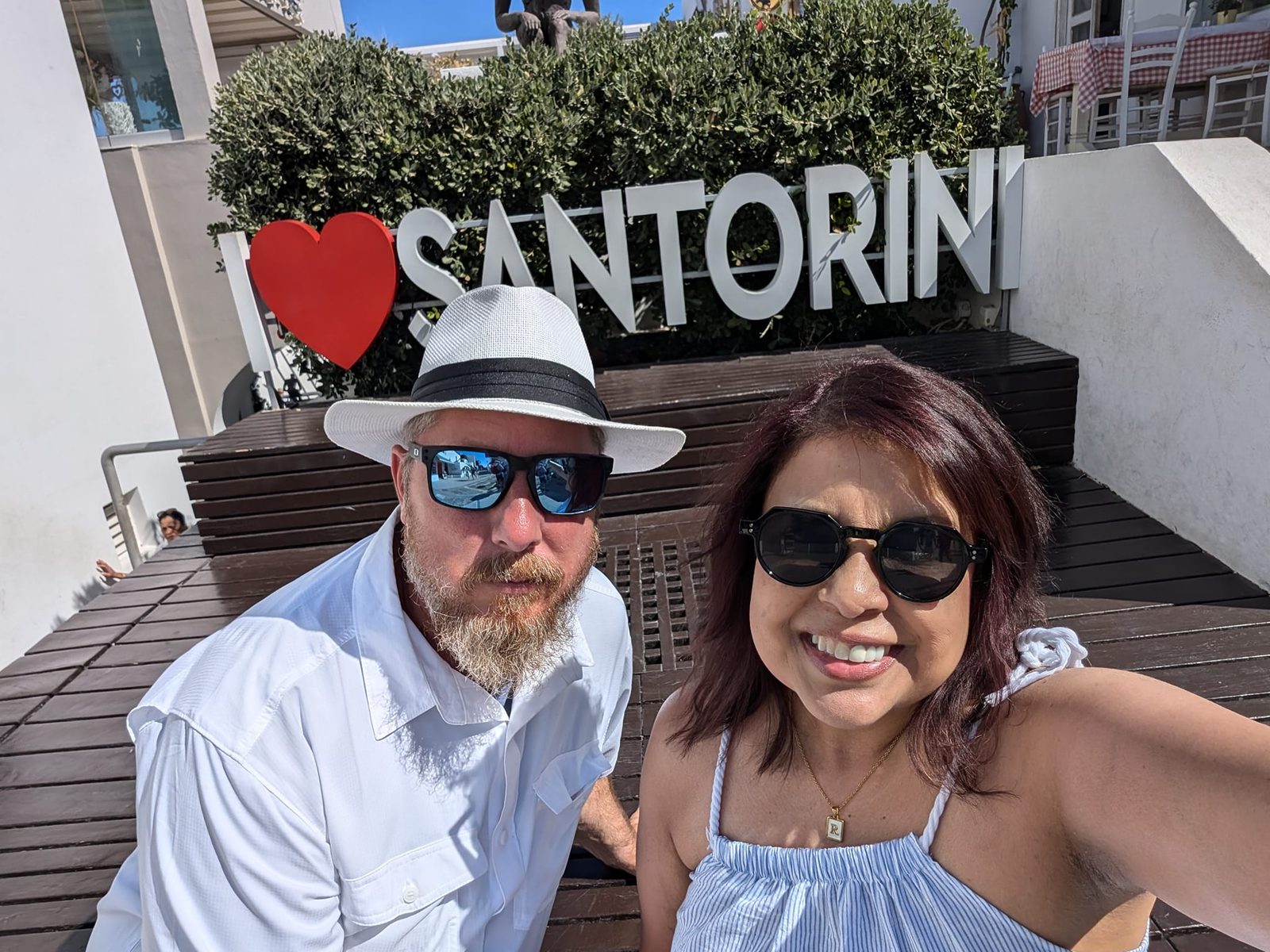 Larence and Ruthy at the I Love Santorini sign